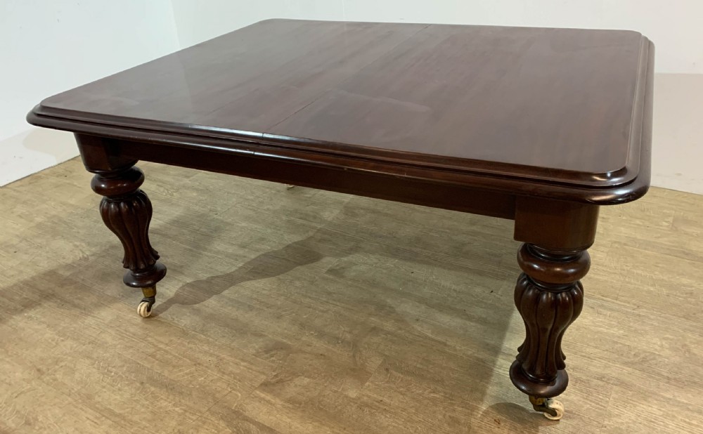 A Large Victorian Mahogany Dining Table seats 12/14 View XII