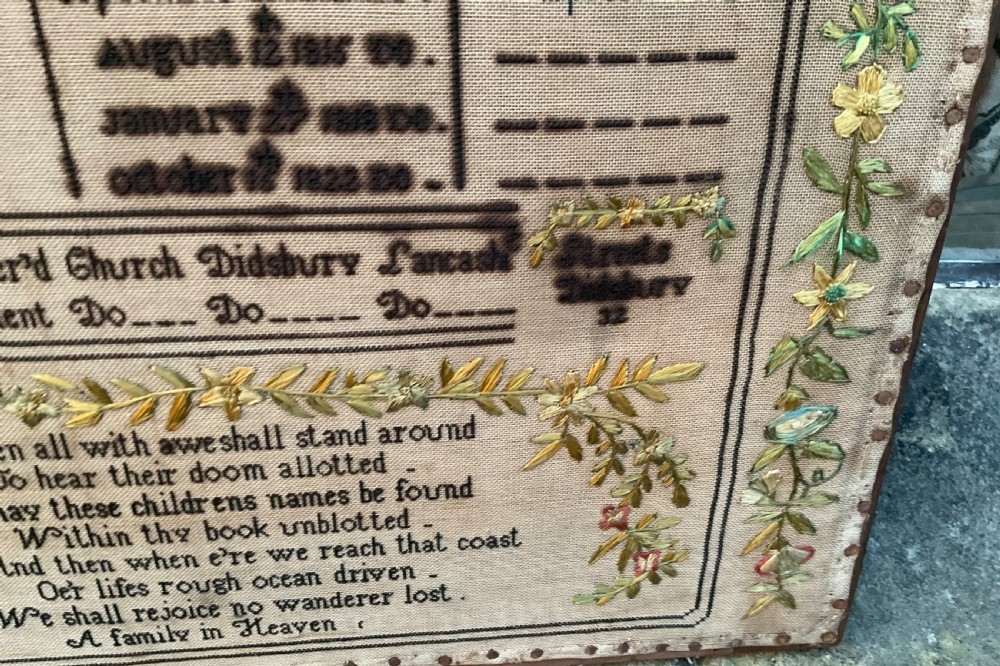 An 1832 Georgian embroidered linen needlework sampler featuring a family register, verse, winged figures, and a floral border. View III
