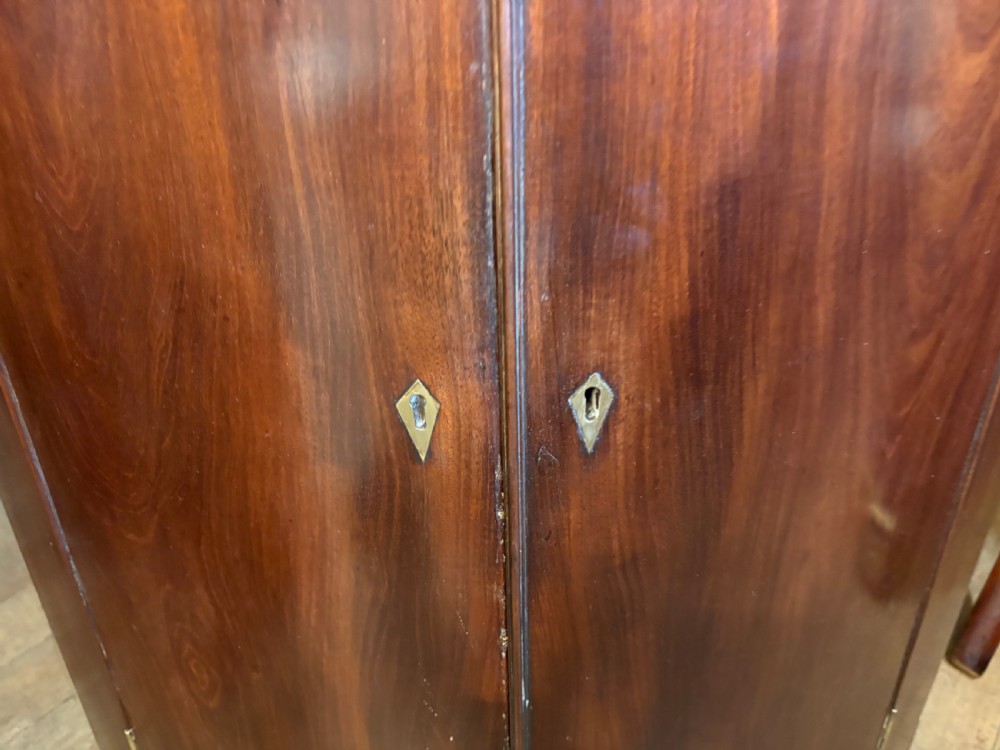 A fine Georgian mahogany corner cupboard  View III
