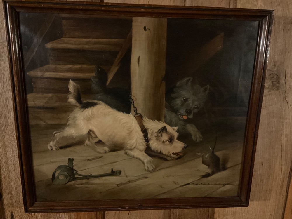 A wonderful oil on canvas of two terriers just missing the rat