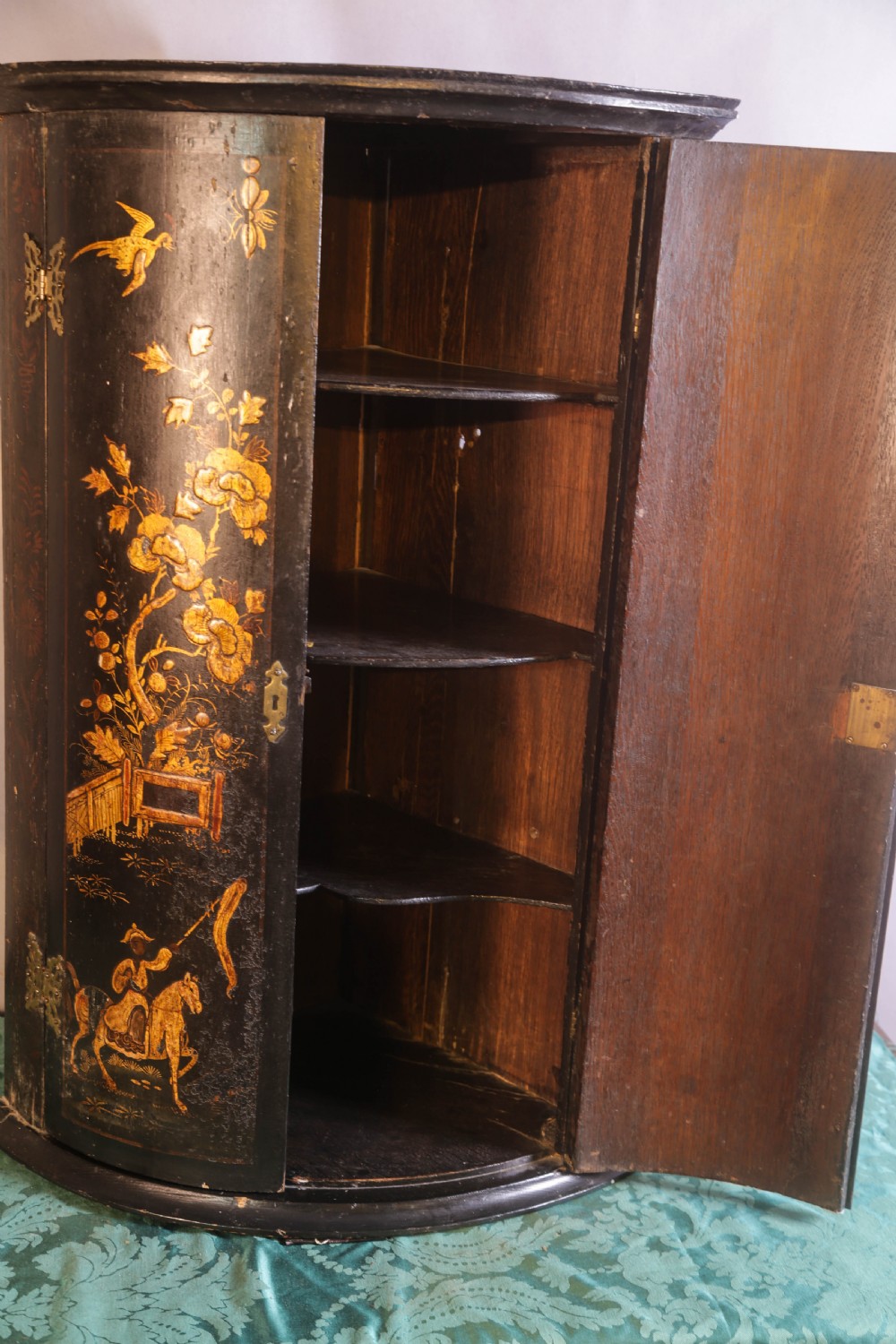 An early 18th century laqured Corner cupbord  View V