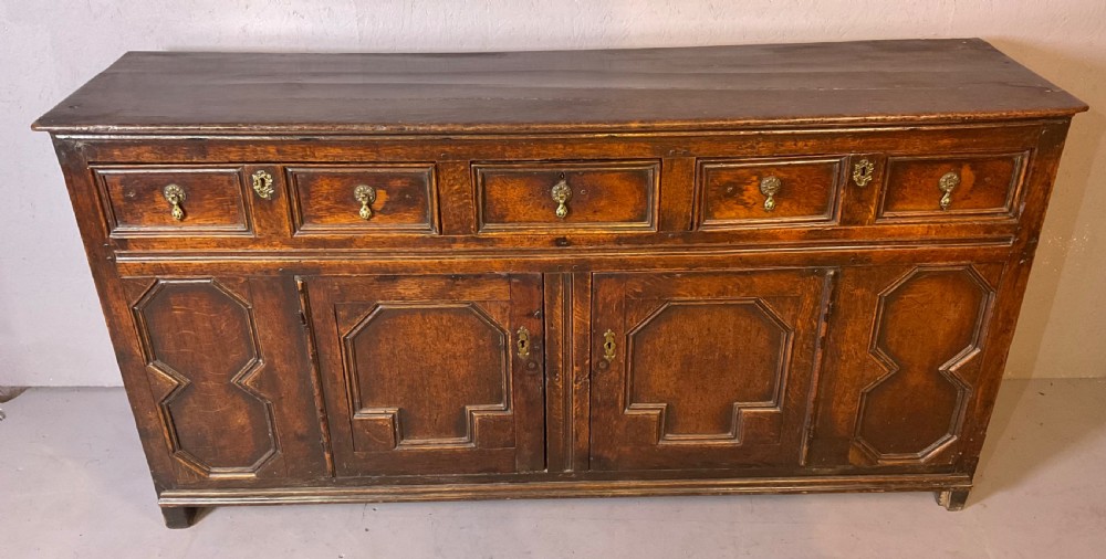 Early 18th century oak dresser geometric front panels View III