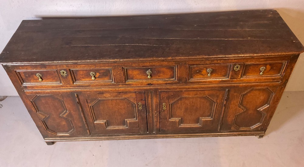 Early 18th century oak dresser geometric front panels View IX