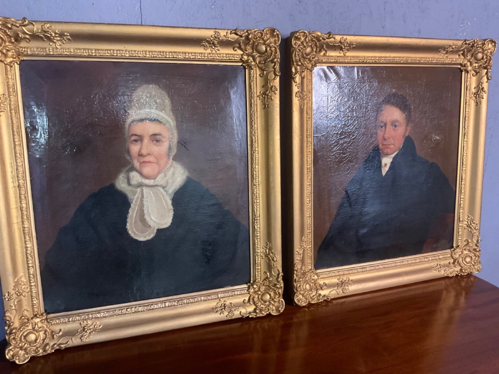 A pair of Regency period oil paintings on canvas depicting a gentleman and a lady in matching ornate gold gilt frames. View IV