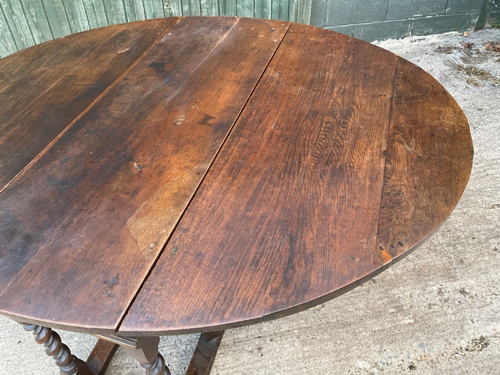 A super large 17th c gate table in Oak seat 8 View II