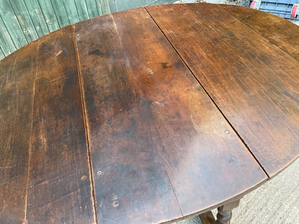 A super large 17th c gate table in Oak seat 8 View III