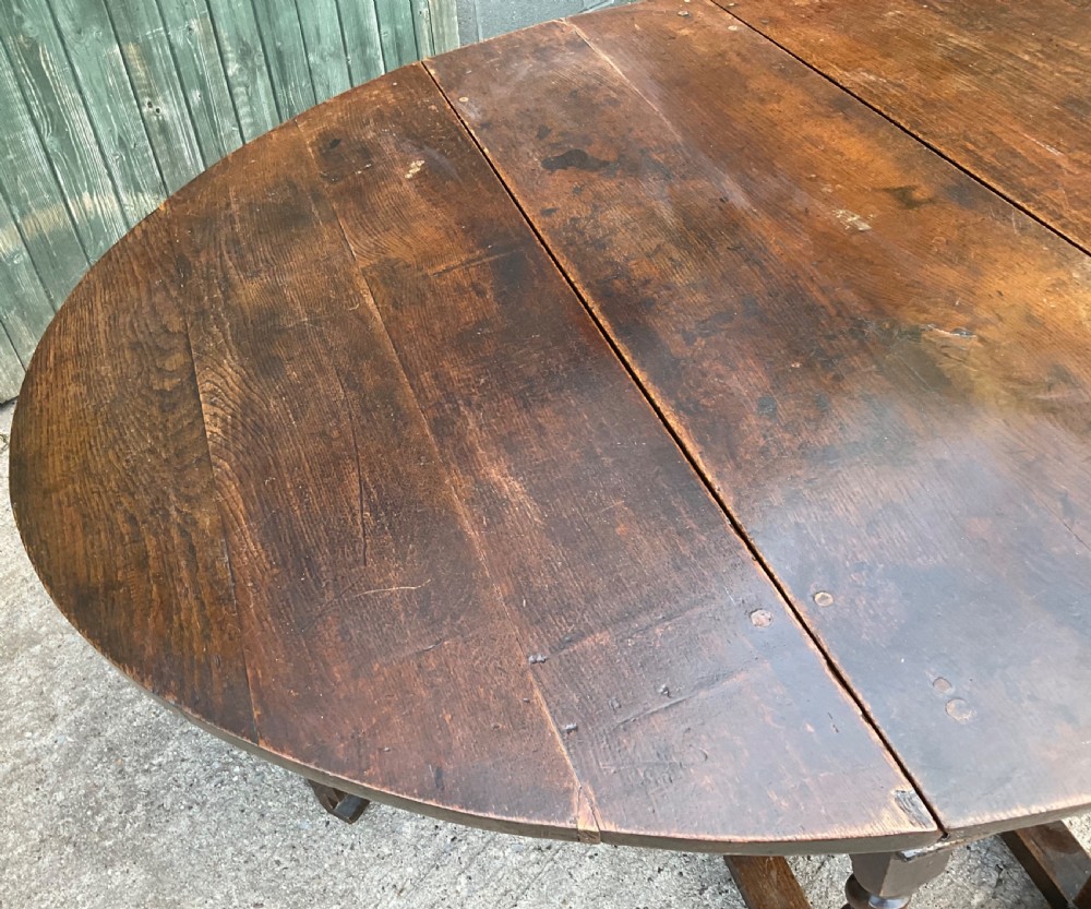 A super large 17th c gate table in Oak seat 8 View IV