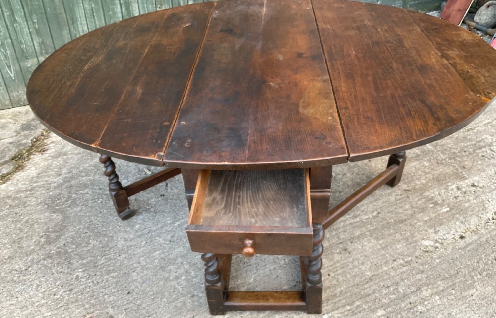 A super large 17th c gate table in Oak seat 8 View IX