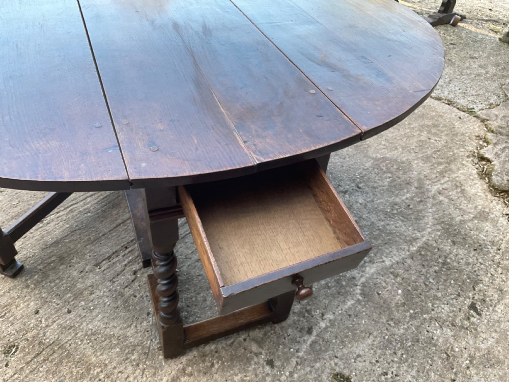 A super large 17th c gate table in Oak seat 8 View XI