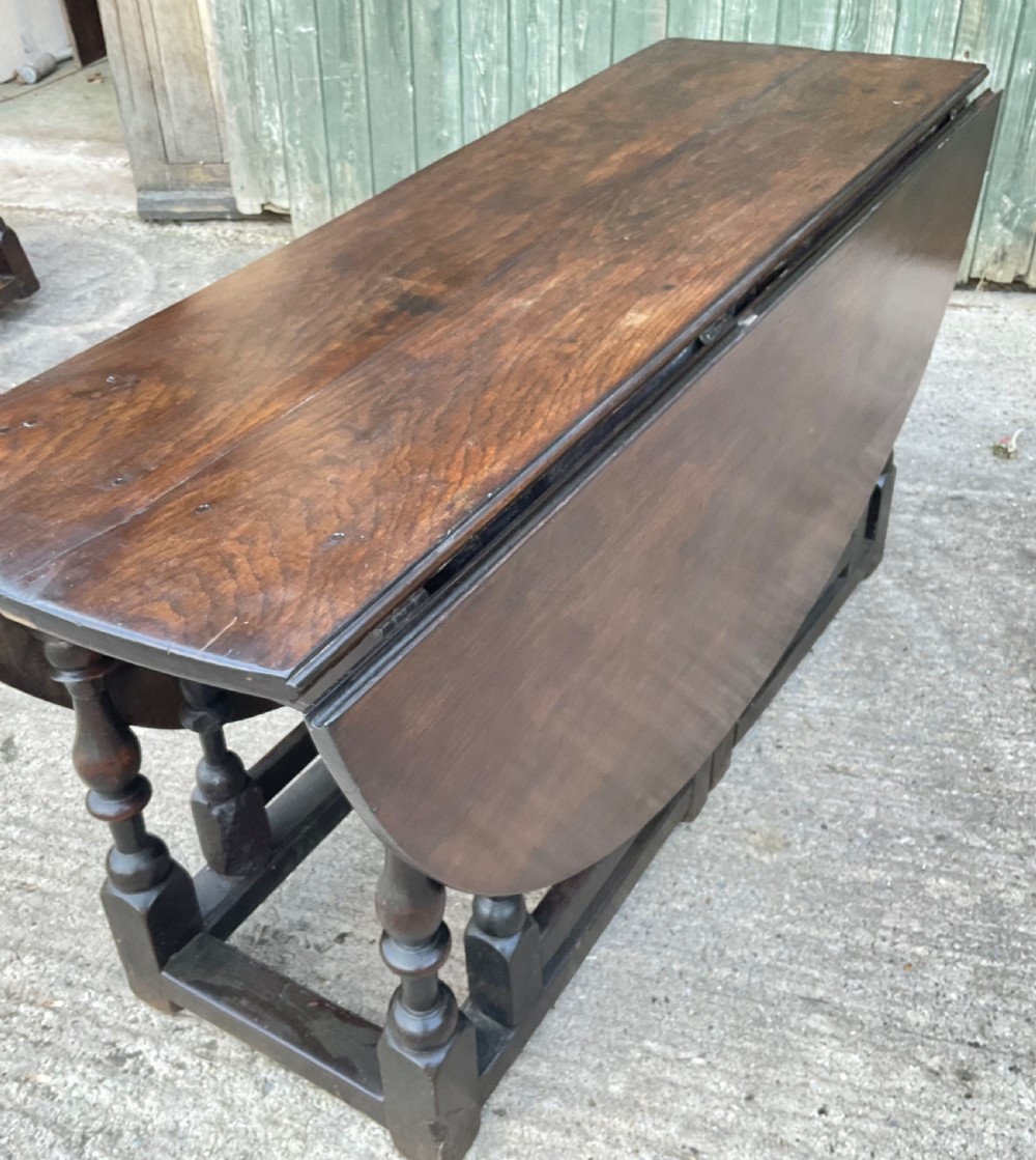 A super large 17th c gate table in Oak seat 8 View XX