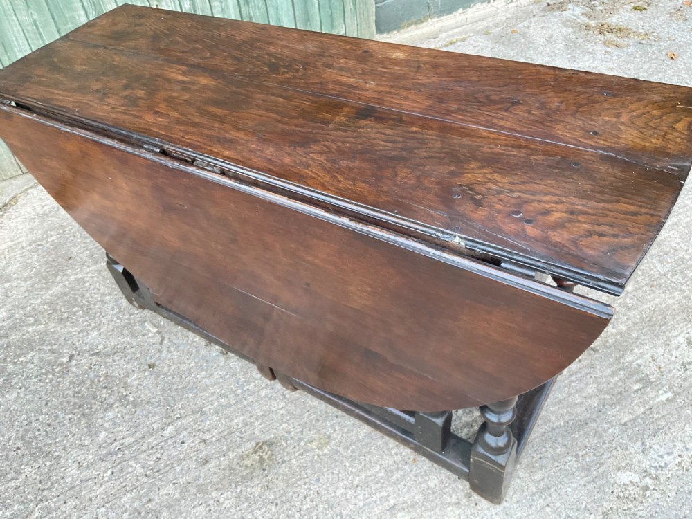 A super large 17th c gate table in Oak seat 8 View XXII