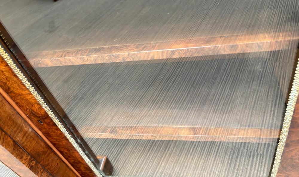 A  Victorian burr walnut and marquetry inlaid low long bookcase View XI