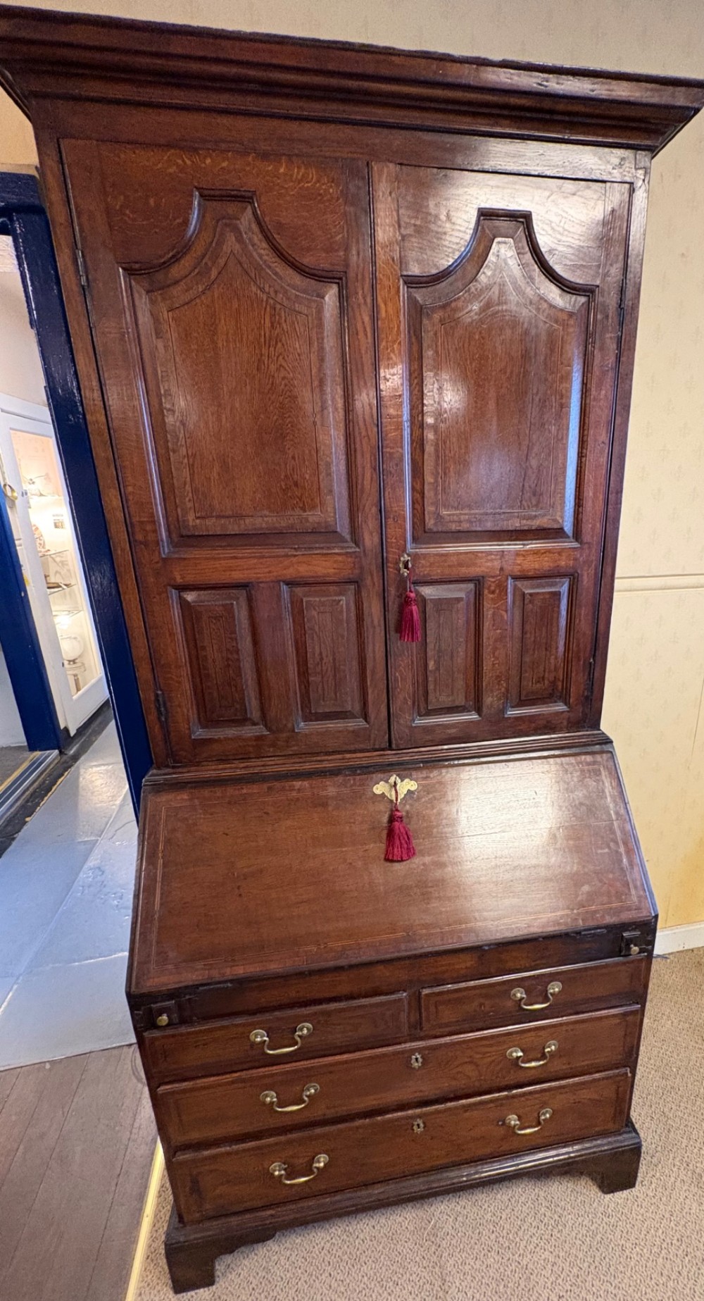 A fine 18th century Bureau bookcase in oak.  stepped interior