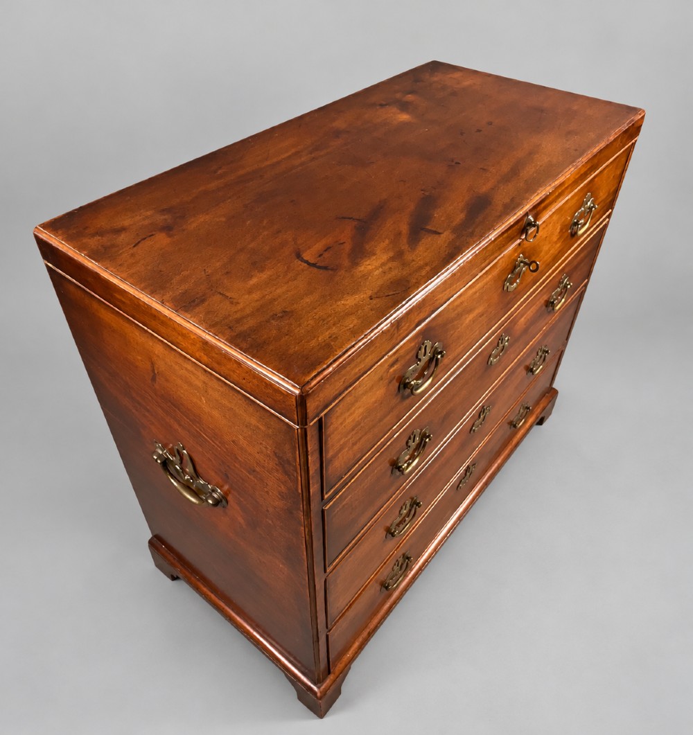 An 18th-century mahogany campaign dressing chest featuring graduated drawers with brass bail handles, side carrying loops, and bracket feet. View VIII
