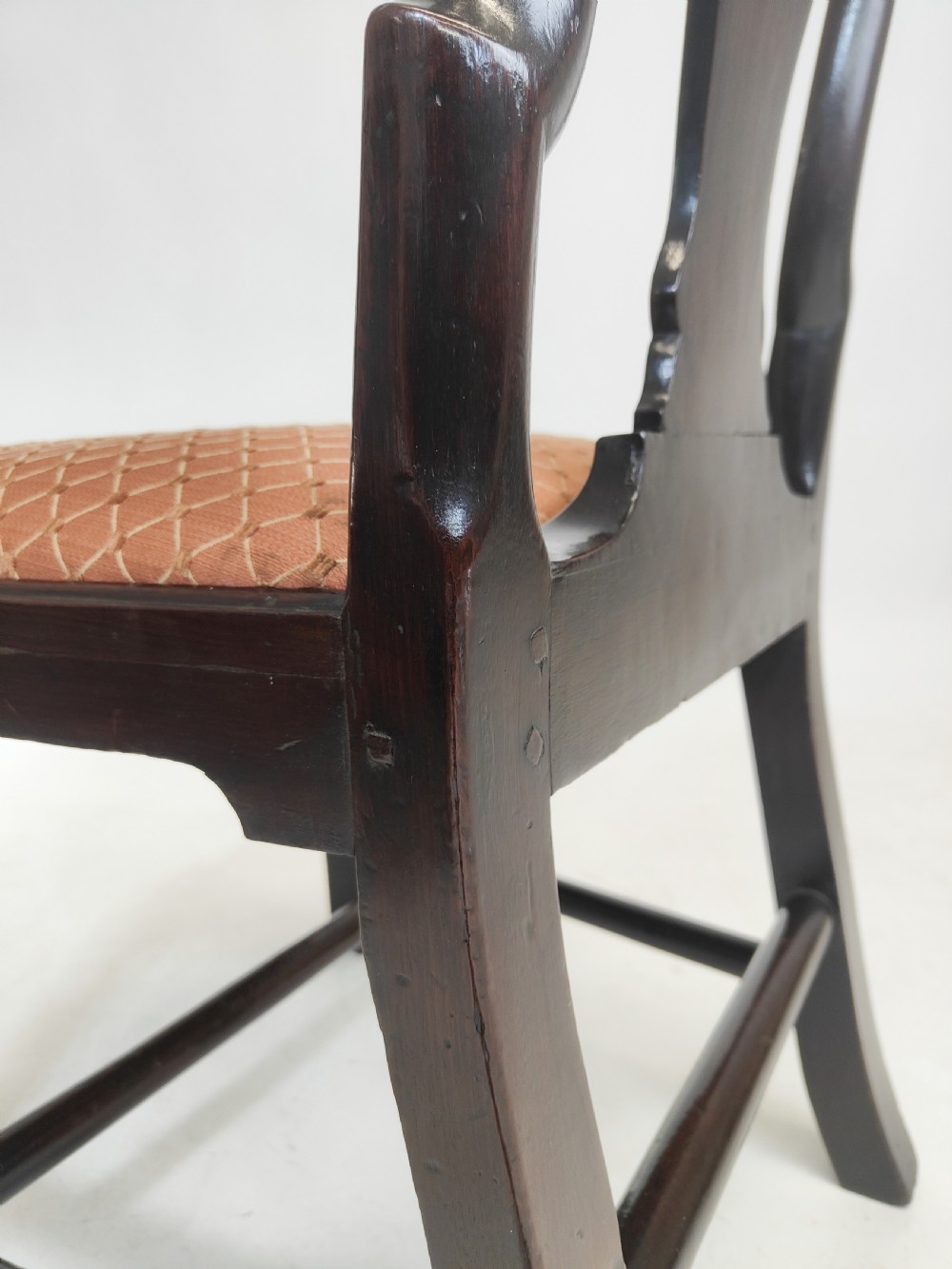 An eighteenth-century dark mahogany side chair featuring a vasiform splat back and a geometric patterned drop-in seat. View XI
