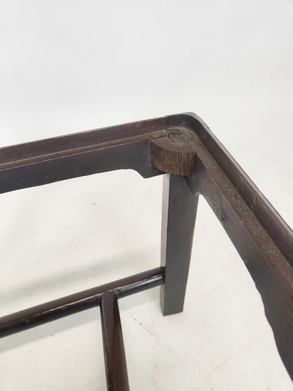 An eighteenth-century dark mahogany side chair featuring a vasiform splat back and a geometric patterned drop-in seat. View XII