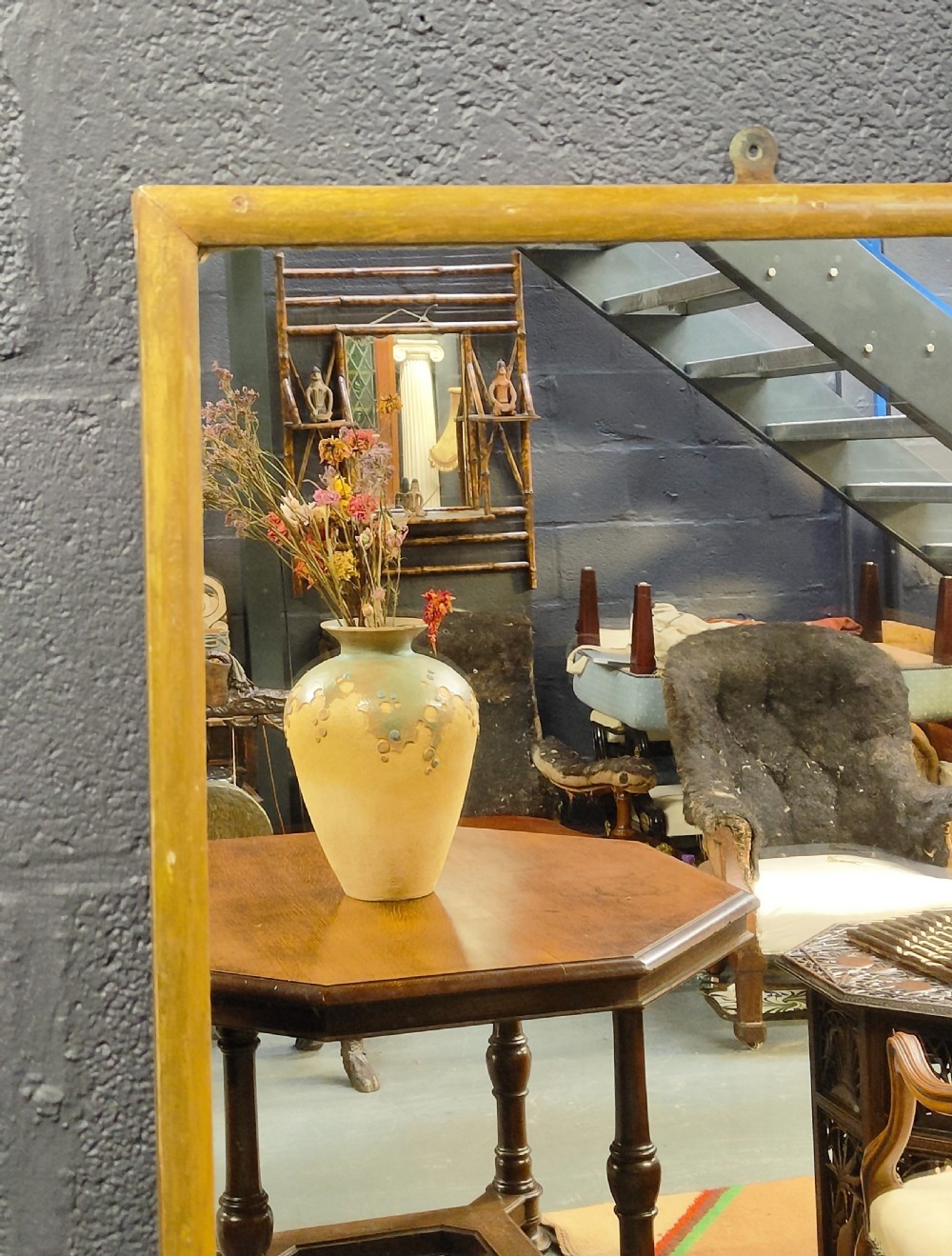 A tall rectangular full-length mirror featuring a slender giltwood frame and flat reflective glass plate. View III