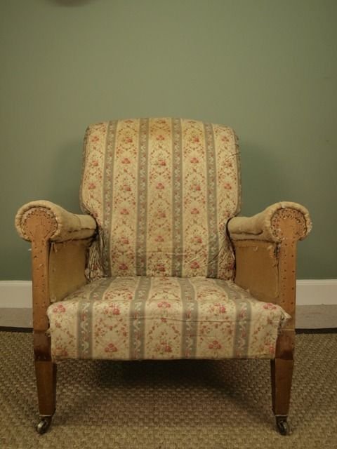 A Genuine Howard & Sons Upholstered Armchair