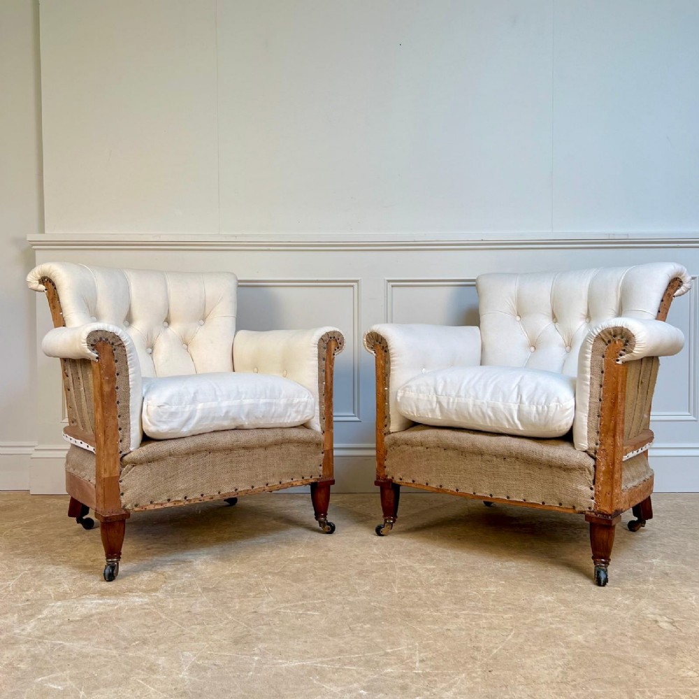 A Pair of Howard Woodstock Style Armchairs