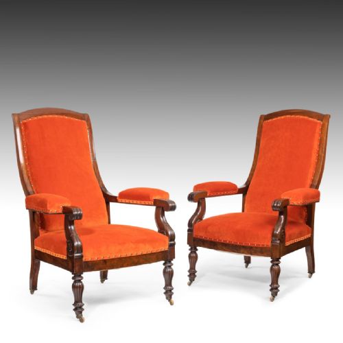 A Pair of Regency Period Cuban Mahogany Arm Chairs