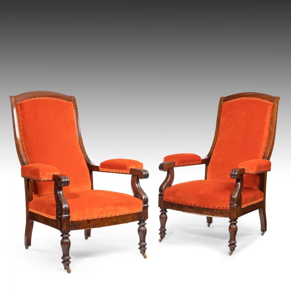 A Pair Of Regency Period Cuban Mahogany Arm Chairs