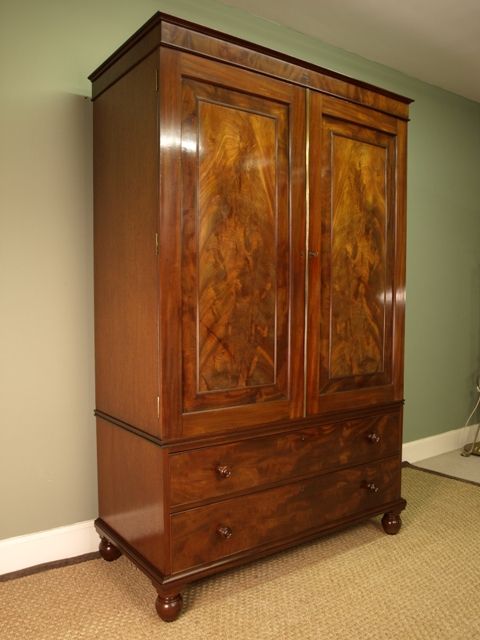 fig 1. A George IV Mahogany Linen Press