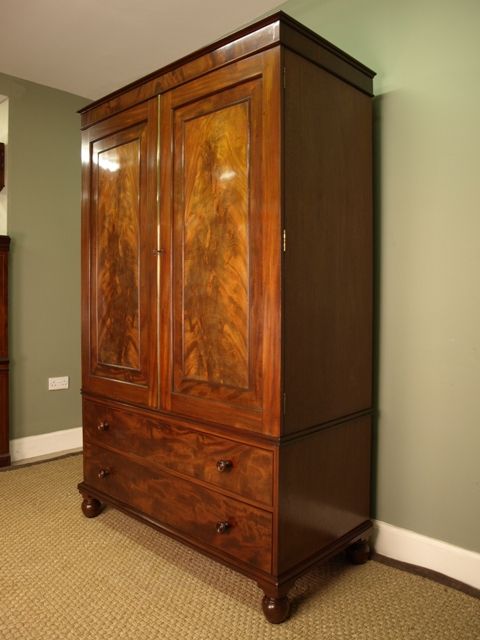 fig 2. A George IV Mahogany Linen Press