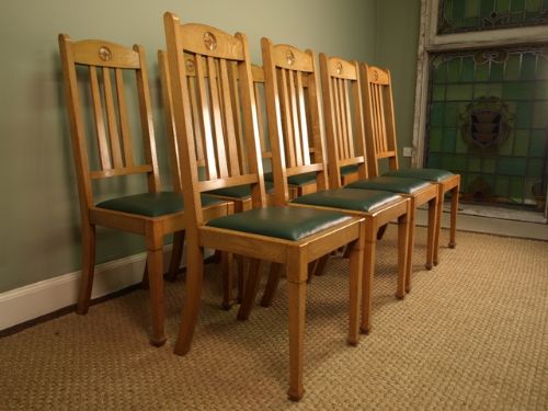 fig 1. A Set of 8 Stylish Oak Dining Chairs