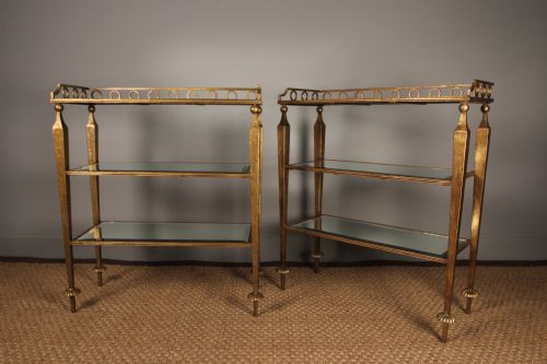 A Pair of Gilded Tiered Mirrored Console Tables