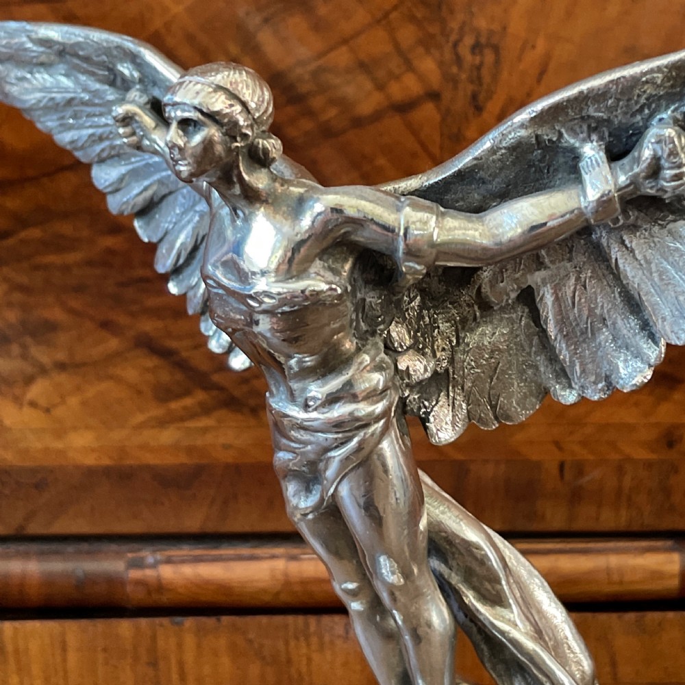 A silvered Bronze Finnigans Icarus car mascot C 1925 View II