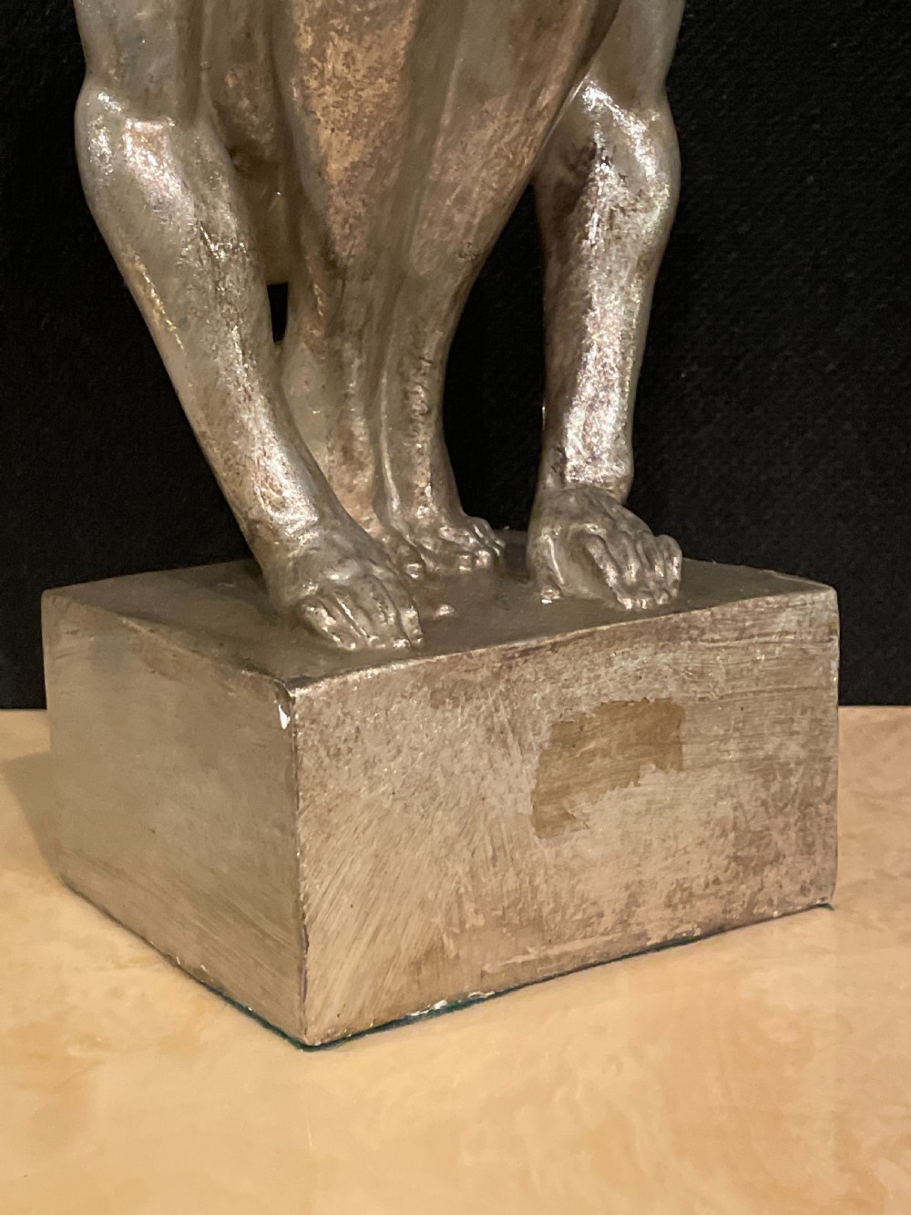 An Art Deco silvered figure of a crouching male nude View X