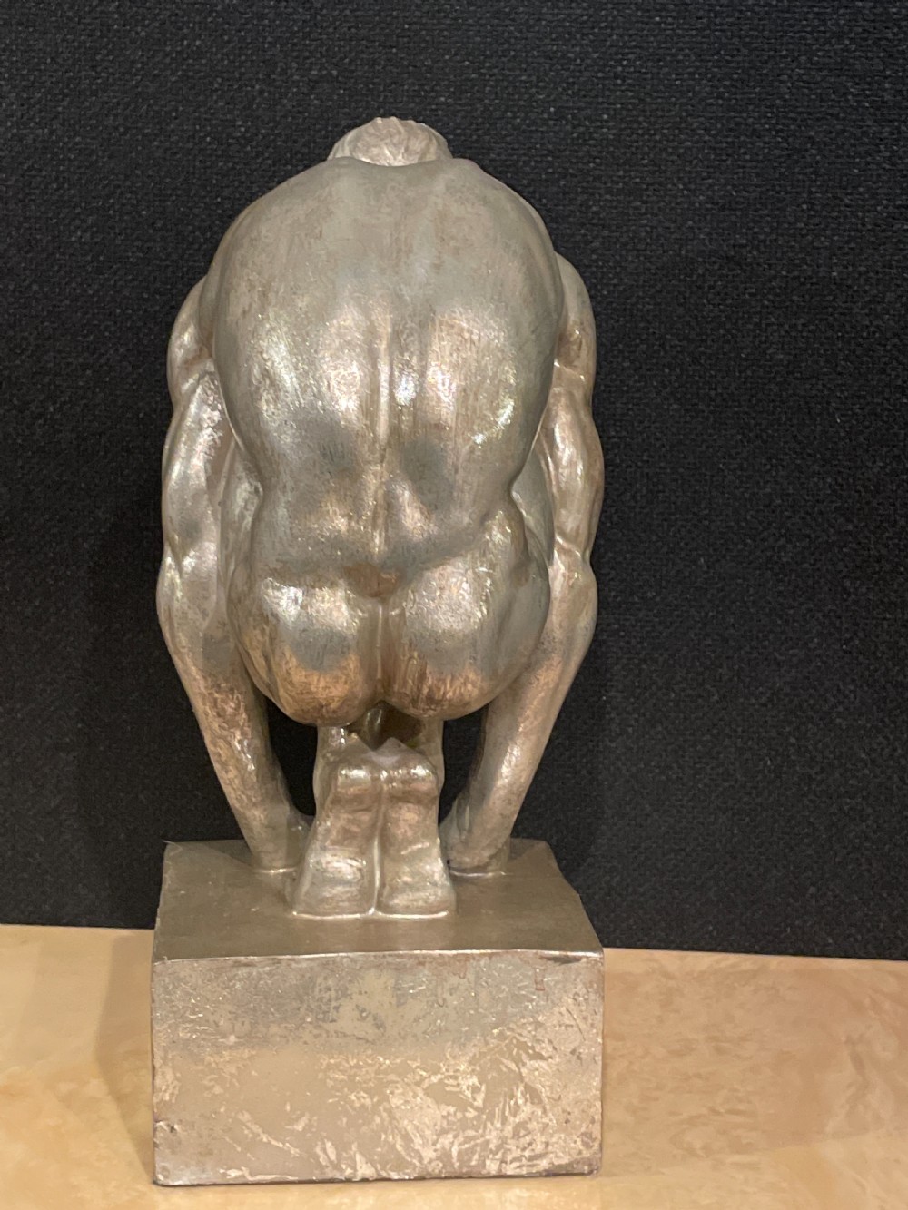 An Art Deco silvered figure of a crouching male nude View XI