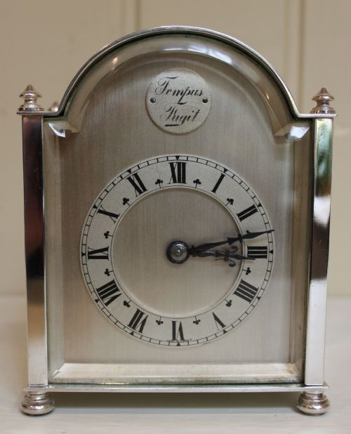 fig 1. Silver Plated Break-Arch Top Mantel Clock