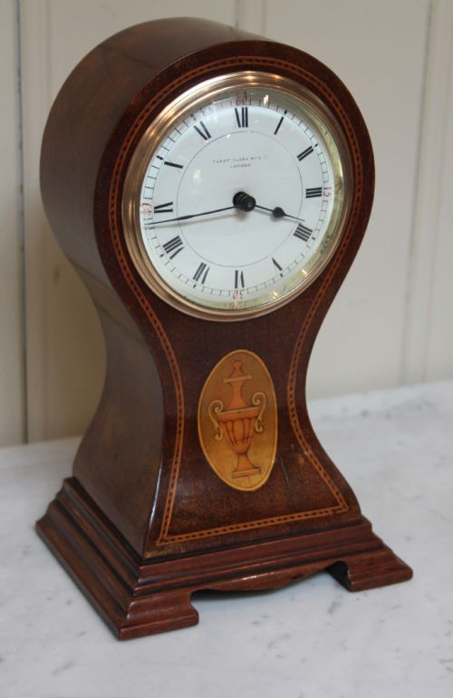 Edwardian Mahogany Waisted Balloon Clock