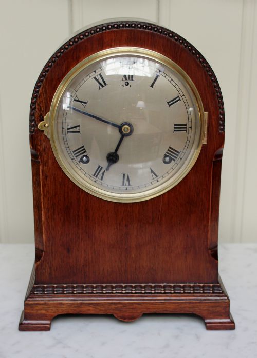 Mahogany Arch Top Mantel Clock