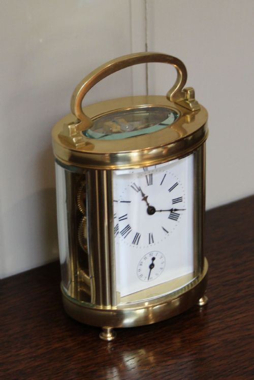 fig 1. Large Late 19th Century Oval Alarm Carriage Clock (France, c. 1890)