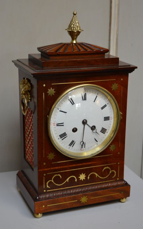 Regency Style Mahogany and Brass Inlay Chamfer Top Bracket Clock