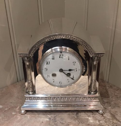 fig 1. Silver Plated Striking Mantel Clock (England and France, c. 1910)