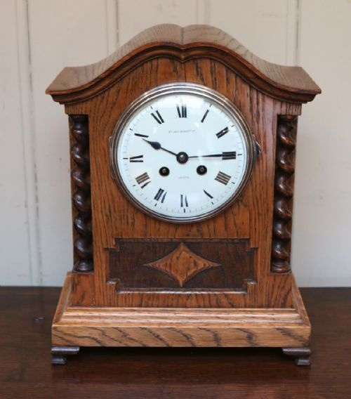 Striking Oak Mantel Clock