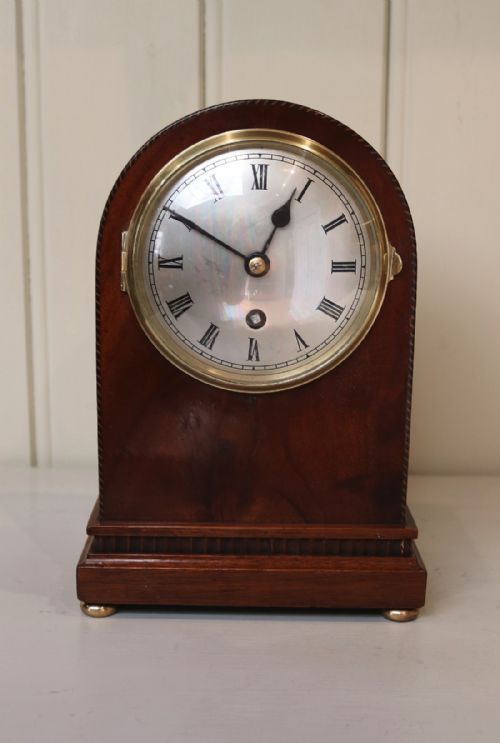 fig 1. Mahogany Arch Top Mantel Clock (England, c. 1920)