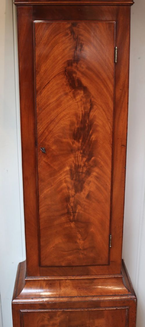 fig 1. Figure Mahogany Longcase Clock (England, 1830 to 1840)