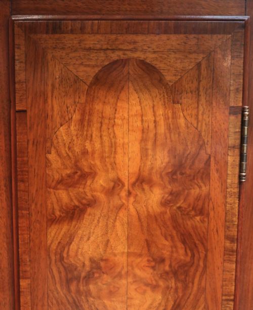 fig 1. Figured Walnut Westminster Chime Grandmother Clock (England, c. 1920)