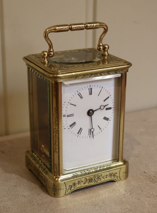 fig 1. Engraved Brass Carriage Clock (France, c. 1860)