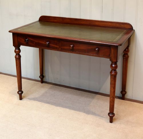 fig 1. Mahogany Leather Top Writing Table