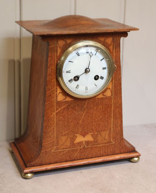 fig 1. Voysey Style Oak Mantel Clock (United Kingdom, c. 1905)
