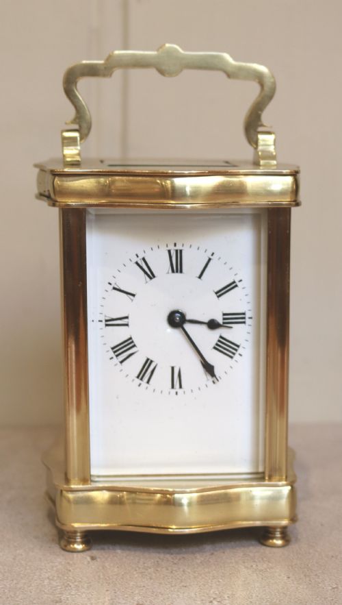 French Serpentine Shaped Brass Carriage Clock (France, C. 1890)
