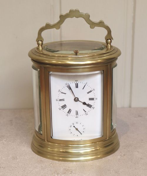French Oval Strike, Repeat and Alarm Carriage Clock (France, 1860)
