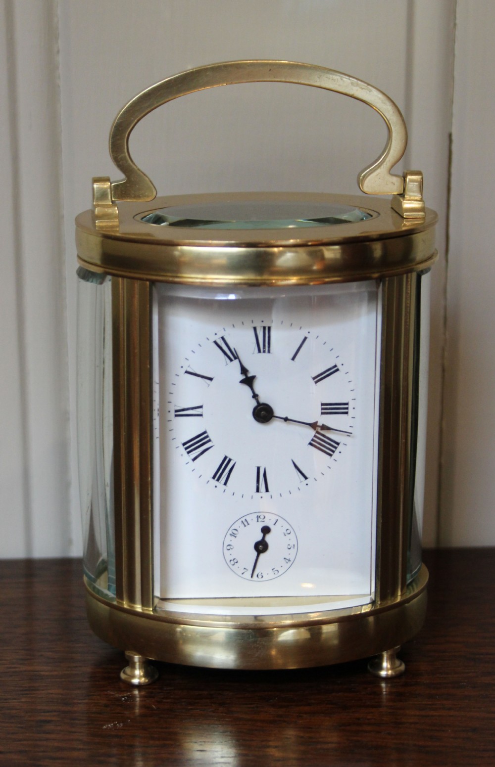 Large Late 19th Century Oval Alarm Carriage Clock (France, c. 1890)