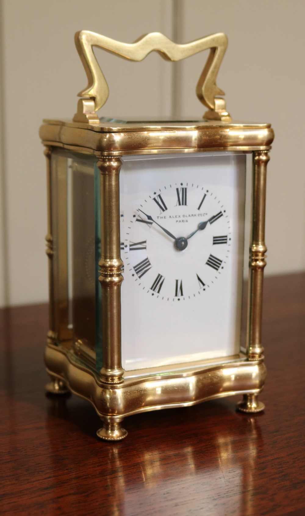 Serpentine Brass carriage Clock (France, 1890)