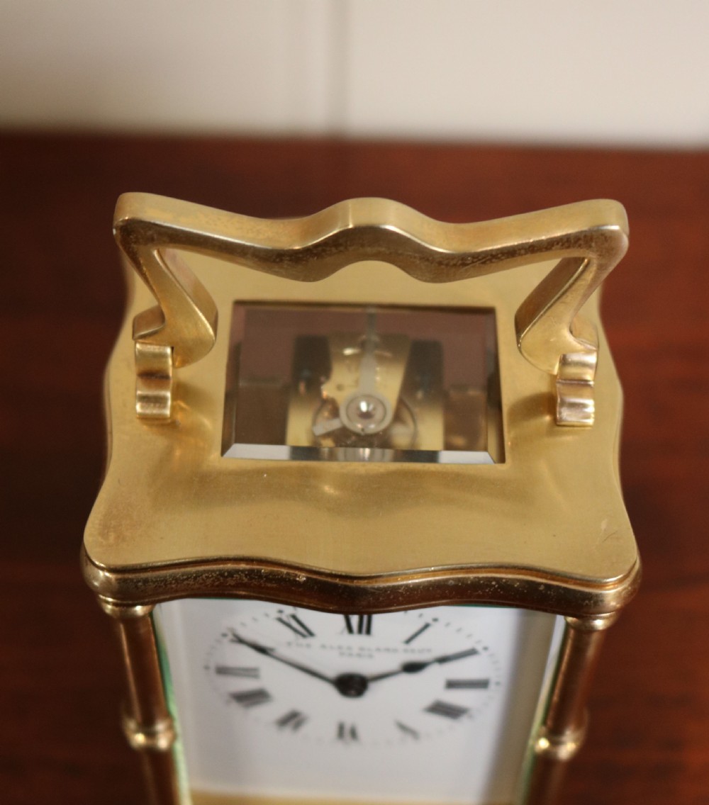 Serpentine Brass carriage Clock (France, 1890) View VI